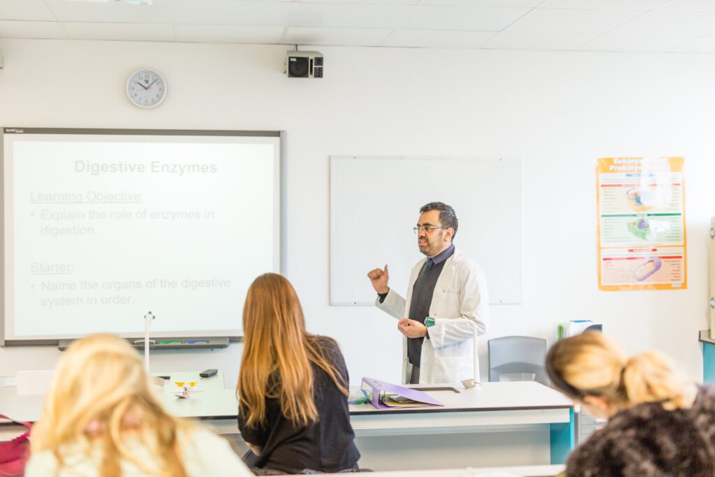 Teacher teaching a class in the science lab